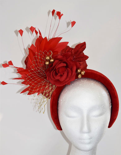 Red feather and floral fascinator